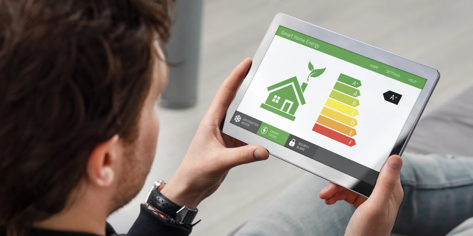person holding tablet looking at home energy score
