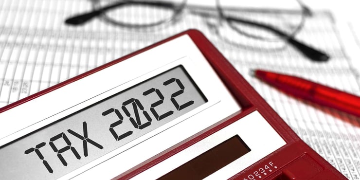 calculator showing tax 2022 text
