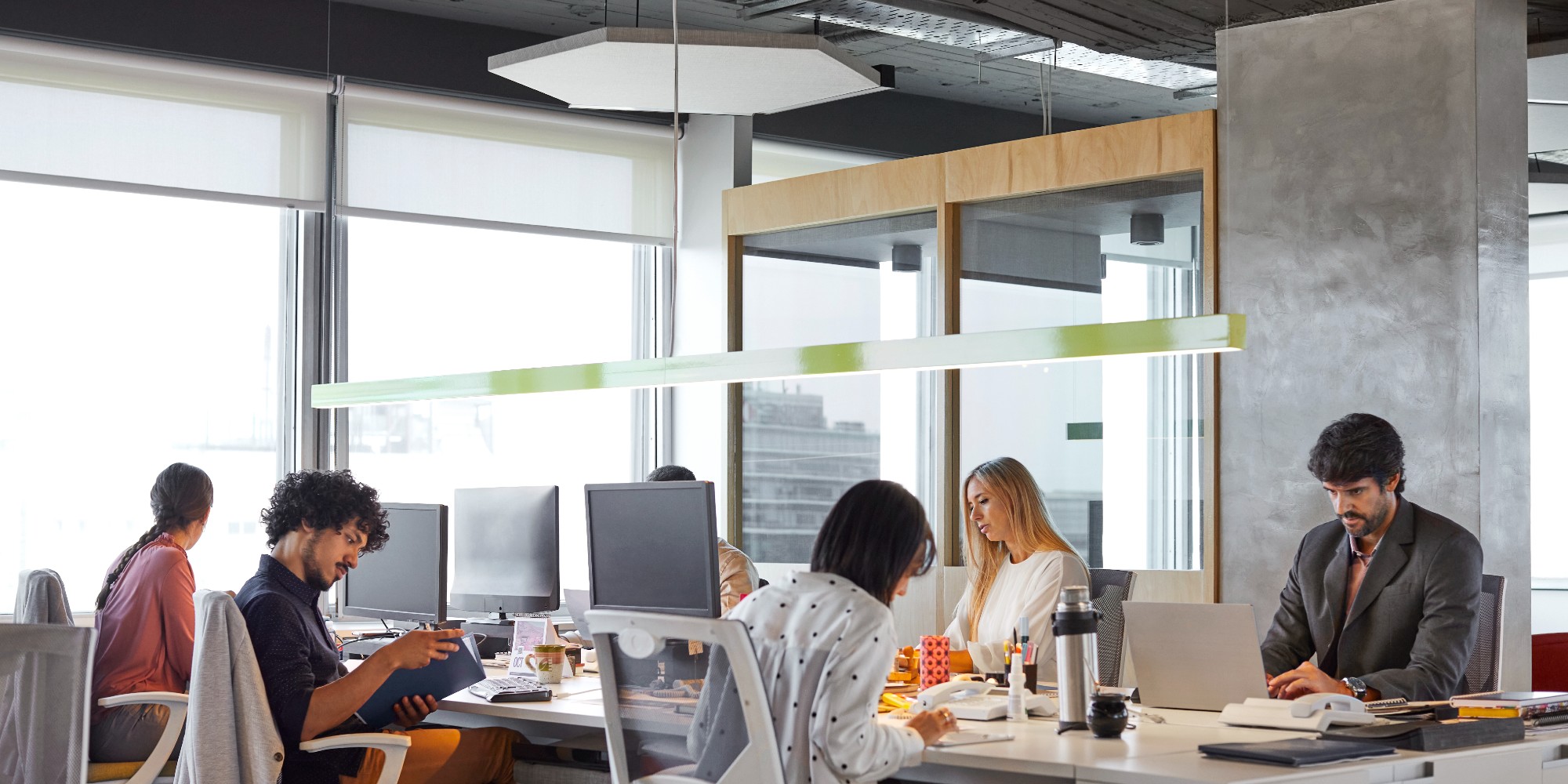 people working in an open concept office