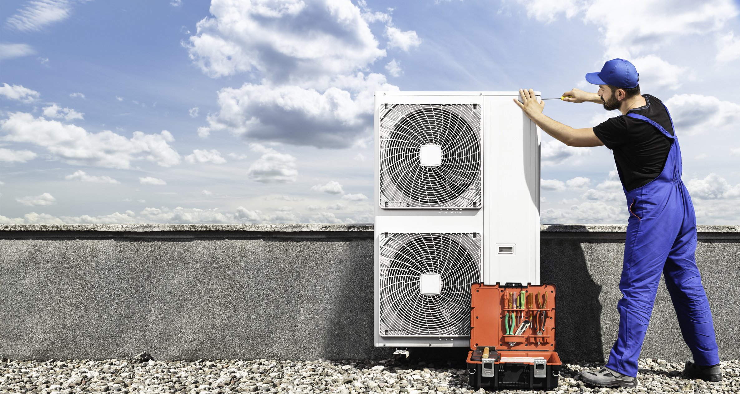 ac repairman on rooftop